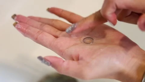 Demonstrating Contact Lens Application Stock Footage 283703189