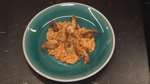 Demonstrating risotto dish overhead Stock Footage 112128199