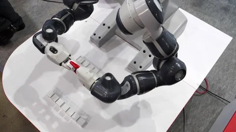 Demonstration of an automated robot when stacking cubes Stock Footage 249525155