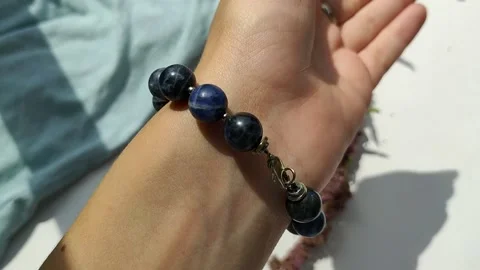 Demonstration of the bracelet on the hand Stock Footage 156802194