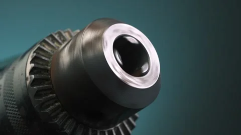 Demonstration of clamping in the chuck of a hand drill. Stock Footage 258580388