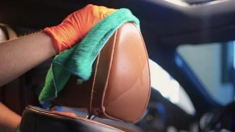 Demonstration of an Expert Car Interior Cleaning Process in Action with Every Stock Footage 309235944
