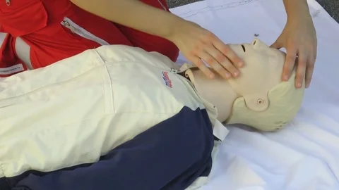 Demonstration of first aid first aid mannequin Stock Footage 80860138