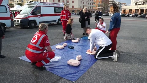 Demonstration of a first aid maneuver Stock Footage 193376401
