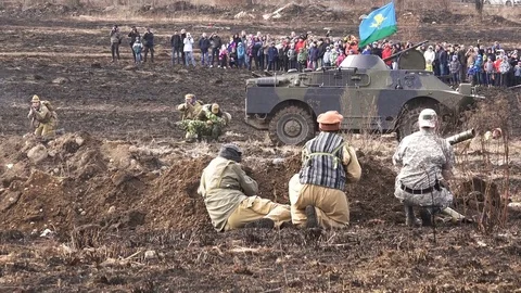 Demonstration of hostilities and confrontation of enemies on a military parade Stock Footage 71221367
