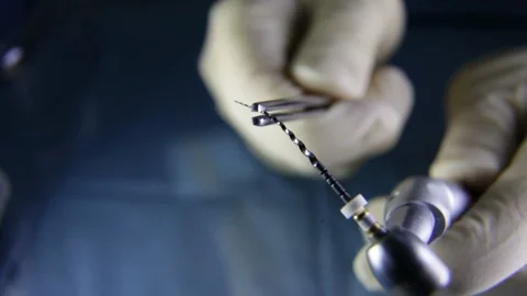 Demonstration of how flexible Nickel-titanium file.Endodontics.Root canal Stock Footage 116621985