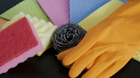Demonstration of kitchen care products: kitchen sponge, absorbent napkins, prote Stock Footage 233277552