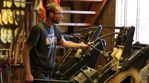 Demonstration on machine for making wooden clogs in The Netherlands Stock-Footage 46199363