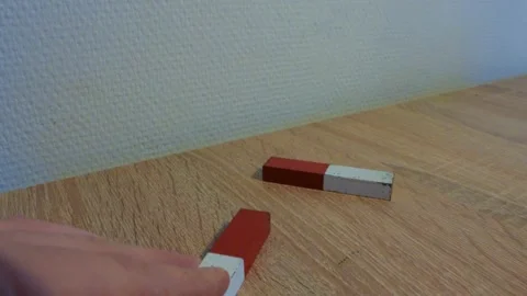 Demonstration of magnets in physics class Stockbeeldmateriaal 259505901