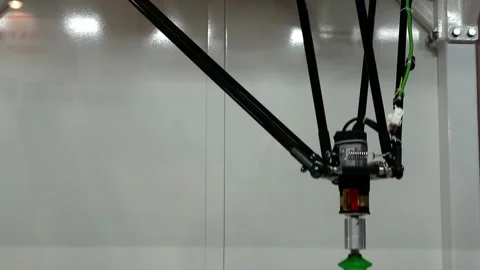 Demonstration of a manipulator for sorting items. Stock Footage 142954162