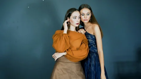 Demonstration of a new collection of clothes, young models with bright make-up Stock Footage 93542374