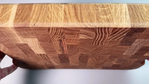 Demonstration of oak end grain cutting board surface close-up Stock Footage 342276869