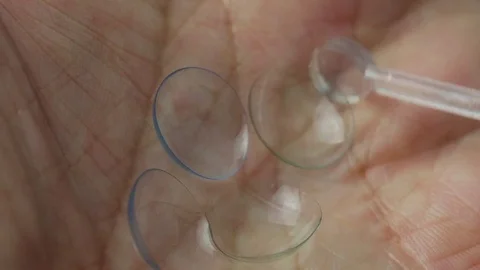 Demonstration of optical soft contact lenses Stock Footage 76167091
