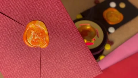 Demonstration of the orange seal on the envelope Stock Footage 304611463