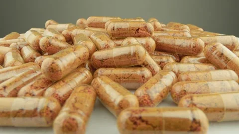Demonstration of pharmaceuticals and nutritional supplements in the form of Stock Footage 262368031