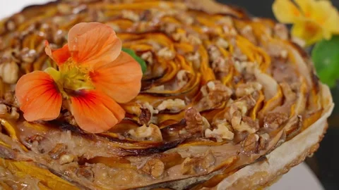 Demonstration of pumpkin pie in a circle. Pumpkin cake rotating on a glass dish. Stock Footage 253995086