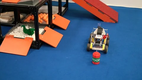 Demonstration of remote control mini-loader possibilities Stock Footage 145363935