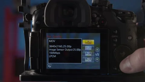 Demonstration of the settings of the different shooting modes on the camera. Stock Footage 234539931