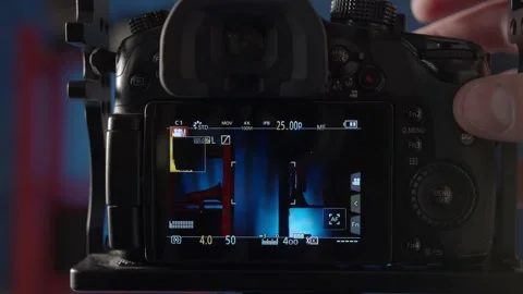 Demonstration of the settings of the different shooting modes on the camera. Stock Footage 234539987