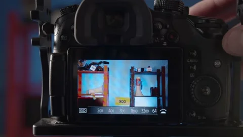 Demonstration of the settings of the different shooting modes on the camera. Stock Footage 234540022