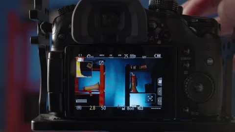 Demonstration of the settings of the different shooting modes on the camera. Stock Footage 234540081