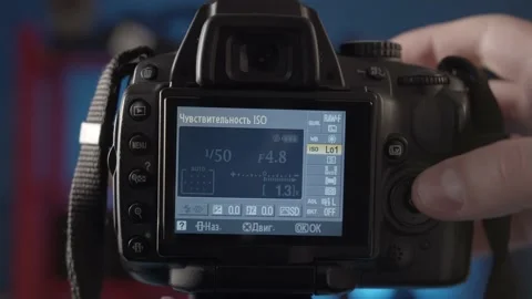 Demonstration of the settings of the different shooting modes on the camera. Stock Footage 234540495