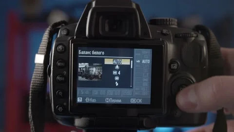 Demonstration of the settings of the different shooting modes on the camera. Stock Footage 234540874