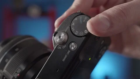 Demonstration of the settings of the different shooting modes on the camera. Stock Footage 234541136