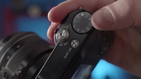 Demonstration of the settings of the different shooting modes on the camera. Stock Footage 234541255