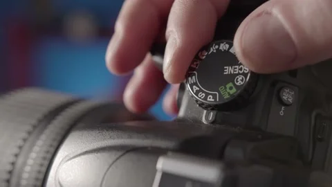Demonstration of the settings of the different shooting modes on the camera. Stock Footage 234541444