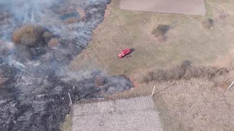 Demonstration of steppe fires from a height Stock Footage 127388212