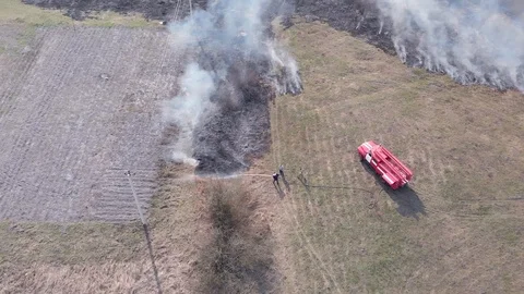 Demonstration of steppe fires from a height Stock Footage 127388300