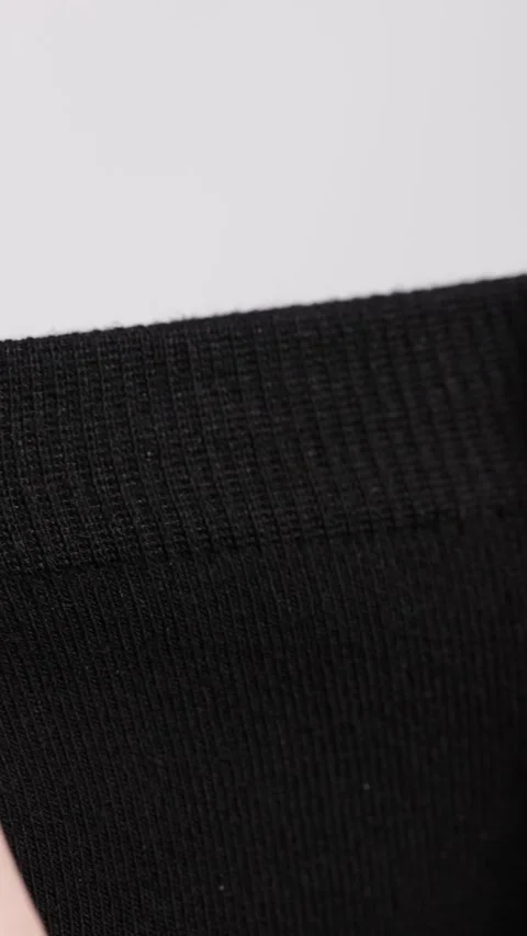 Demonstration of the structure of black socks Stock-Footage 278397455