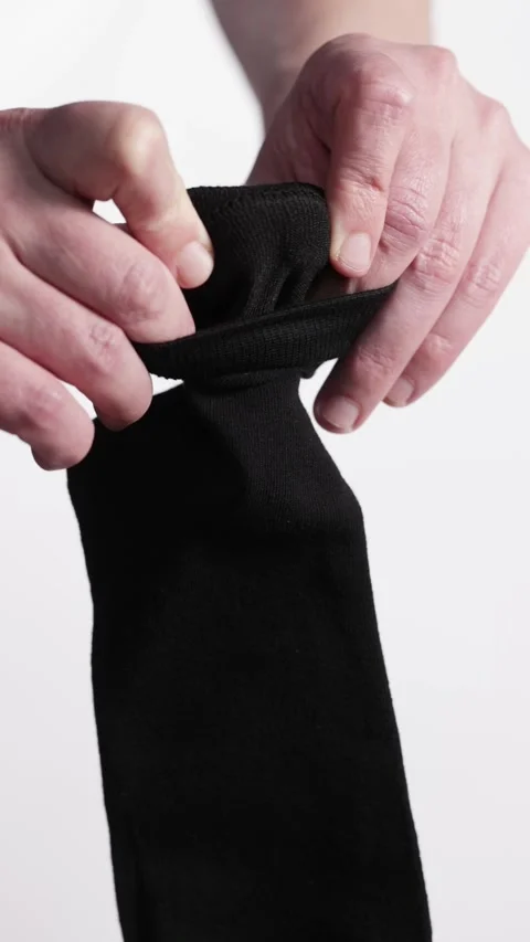 Demonstration of the structure of black socks 스톡 동영상 278397458