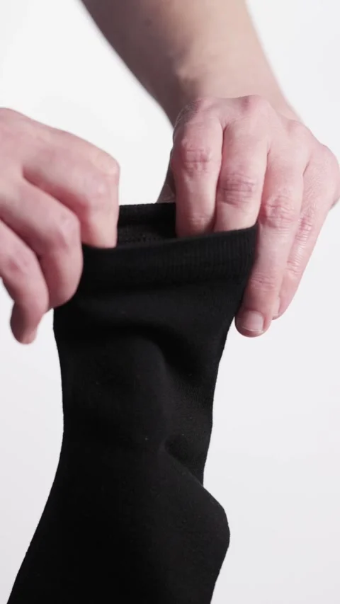 Demonstration of the structure of black socks Video stock 304350466