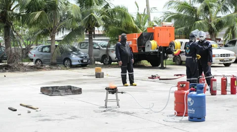 Demonstration of work of firemen at the  Provincial Electricity Authority Stock Footage 29043050