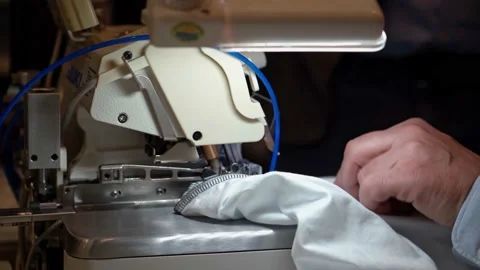 Demonstration of the work of a modern industrial sewing machine Stock Footage 170908375