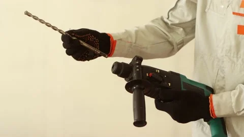 Demonstration of the work of the perforator. Close-up. Video stock 219942899