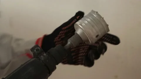 Demonstration of the work of the perforator. Close-up. Stock Footage 219943695