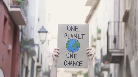 Demonstrator on the city protesting against climate change and pollution - Gl Stock Footage 208661666
