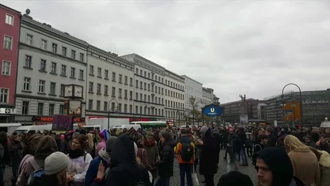 Demonstrators assemble at Hermannplatz  for “me too” demonstration, cloudy day 스톡 동영상 81855472