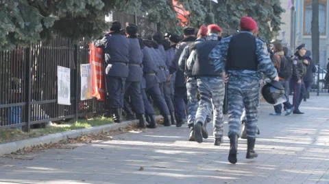 Demonstrators break a protection in Kyiv Stock Footage 34098302