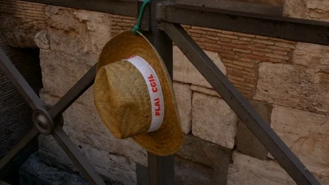 A demonstrator's hat, hanging from a railing Stock Footage 83042467