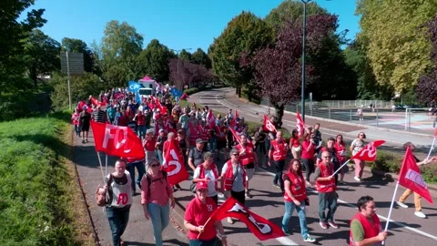 Demonstrators marched through the streets of Besançon Stock Footage 317571115