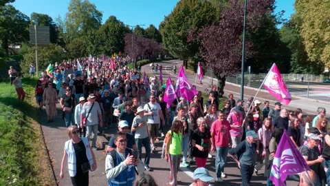 Demonstrators marched through the streets of Besançon Stock Footage 317571139