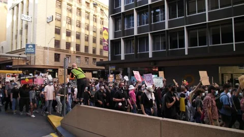 Demonstrators pass through Anzac Square for Black Lives Matter 4K Stock Footage 156994412