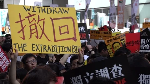 Demonstrators protest against controversial extradition law in Hong Kong Stock Footage