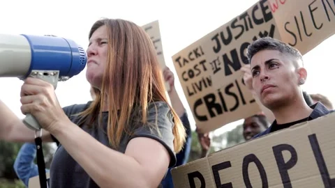 Demonstrators protest financial crisis and inflation on the streets  Stock Footage 256835853