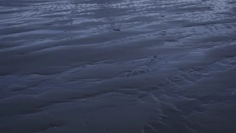 Den Haag Beach Package 18 | Cinematic black beach sand texture reflection Stock Footage 116187911