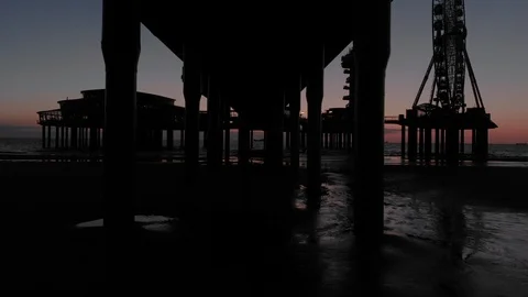 Den Haag Beach Package 22 | Aerial drone shot bridge silhouette in beach coast Video stock 116203860